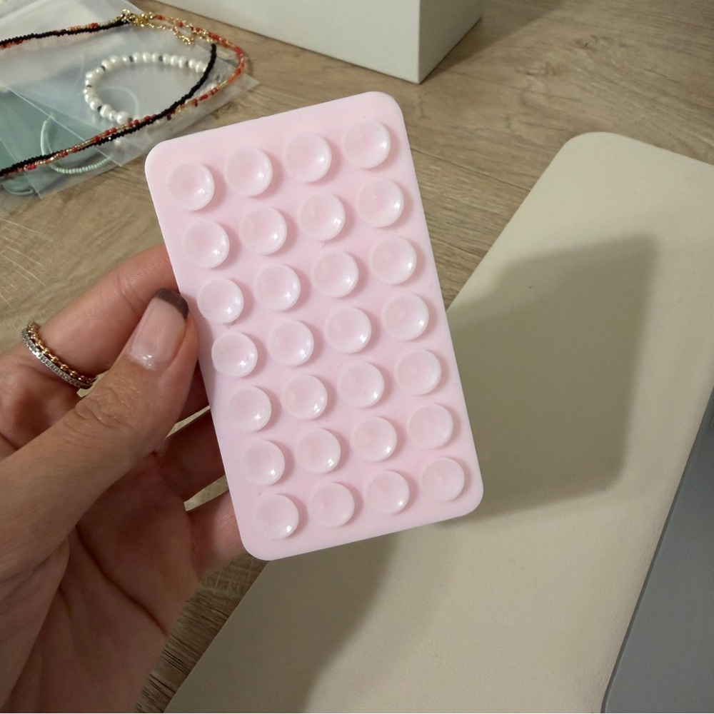 Double sided sticky phone mount